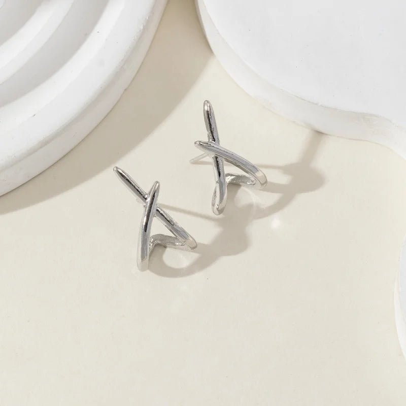 Cross Curve Studs
